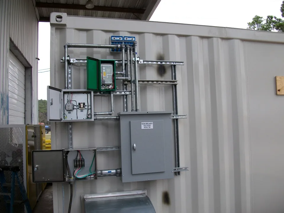 Classified-area electrical panel and conduit inside a C1D1 extraction lab