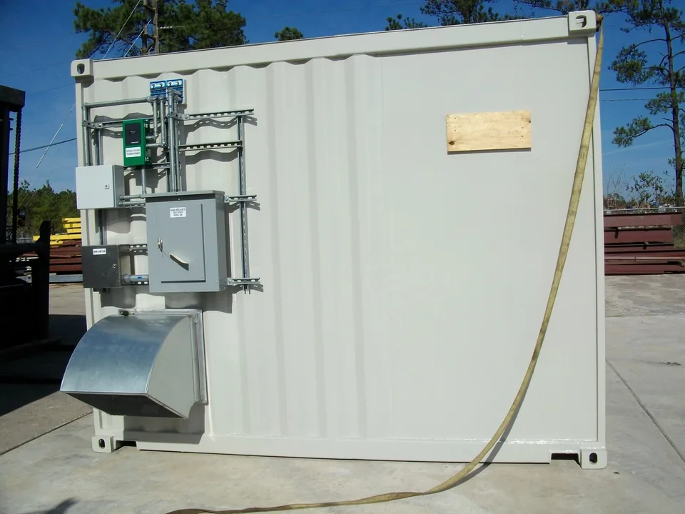 Stainless steel ventilation unit mounted outside a C1D1 extraction lab