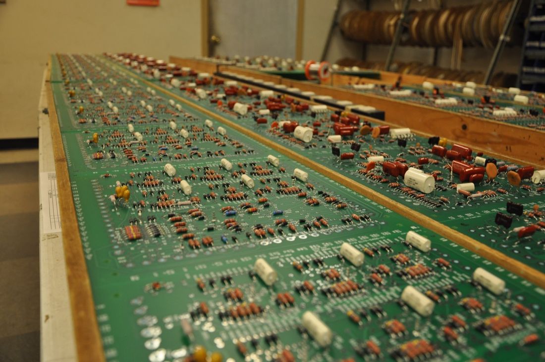 ETSCO bench lined with legacy analog SCR drive control boards awaiting test